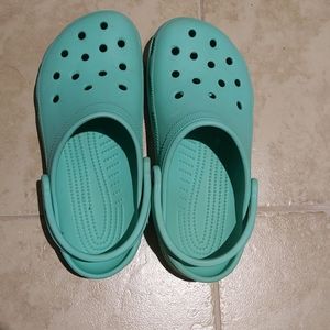 Mint green crocs